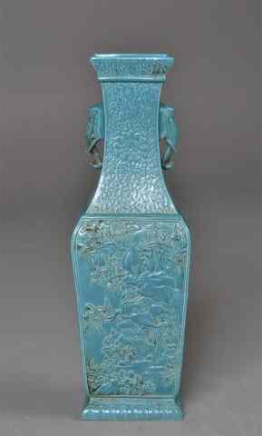 Appraisal: Chinese Porcelain Eight-Treasure VaseFinely molded archaic form turquoise porcelain vase