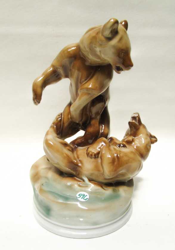 Appraisal: ZSOLNAY PORCELAIN WILDLIFE SCULPTURE depicting two bears at play Height