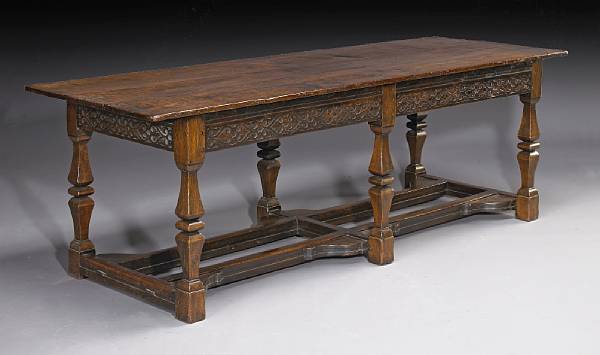 Appraisal: An English Baroque carved oak refectory table composed of antique