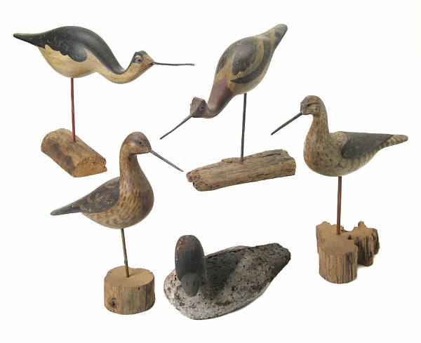 Appraisal: A group of four painted wood shore birds together with