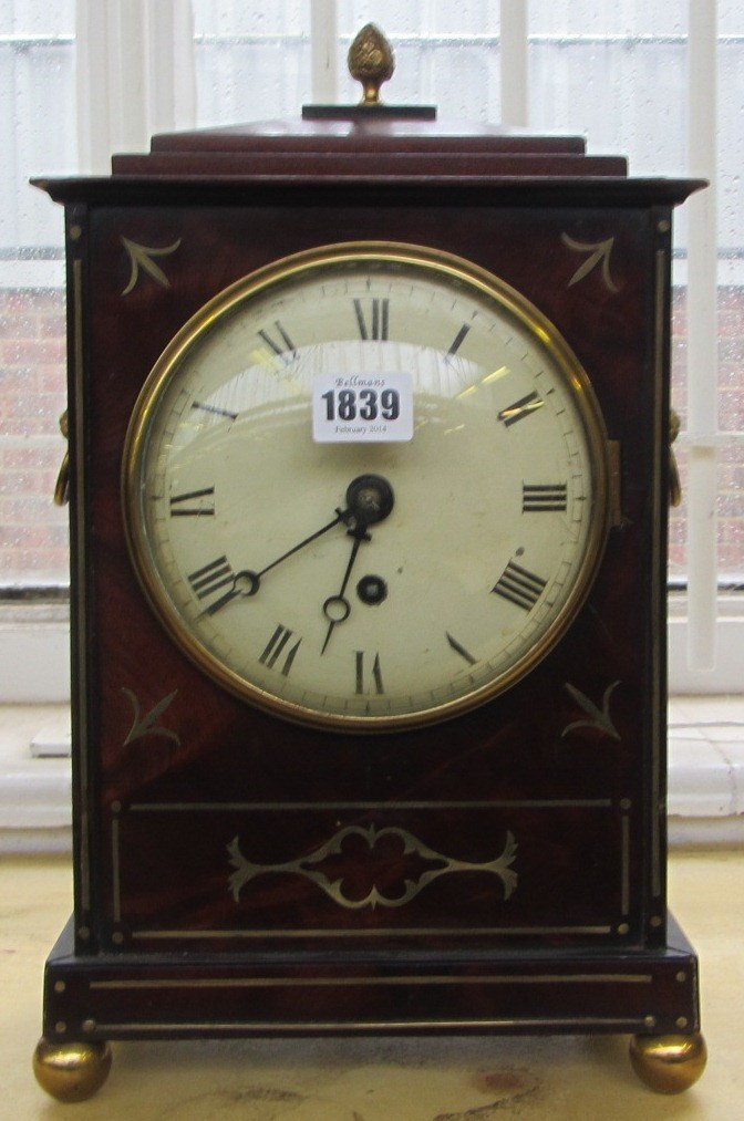 Appraisal: A Regency mahogany bracket clock with brass pineapple finial and