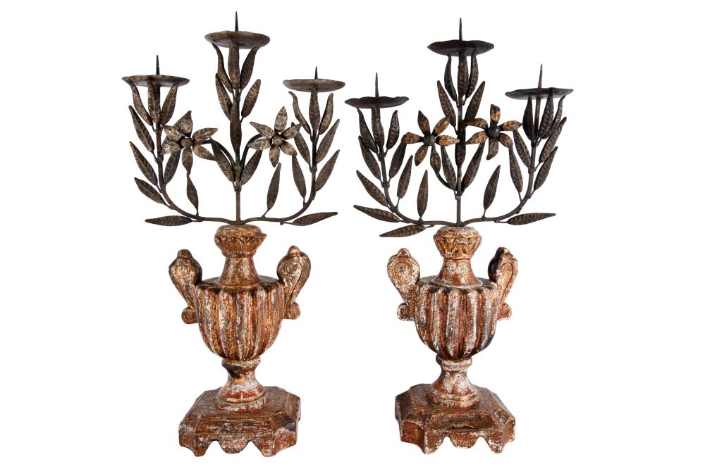 Appraisal: PAIR OF IRON CARVED WOOD CANDELABRAeach with three-light pricket set