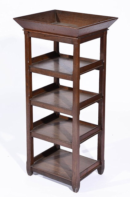 Appraisal: AN ARTS AND CRAFTS OAK FOUR TIER STAND with tray