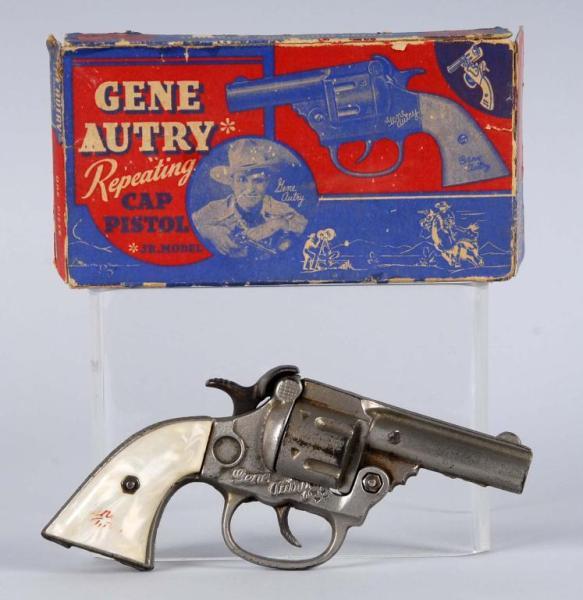 Appraisal: Cast Iron Gene Autry Cap Gun Description A lot of