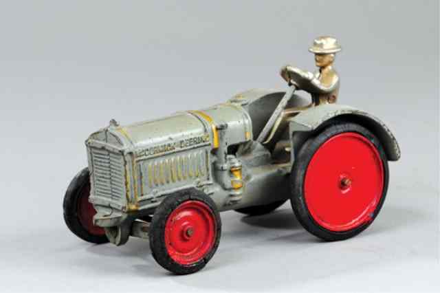 Appraisal: ARCADE McCORMICK DEERING - TRACTOR Cast iron painted in grey