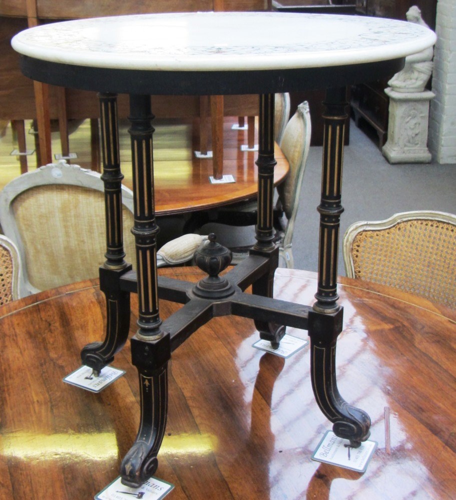 Appraisal: A circular inlaid marble occasional table on parcel gilt ebonised