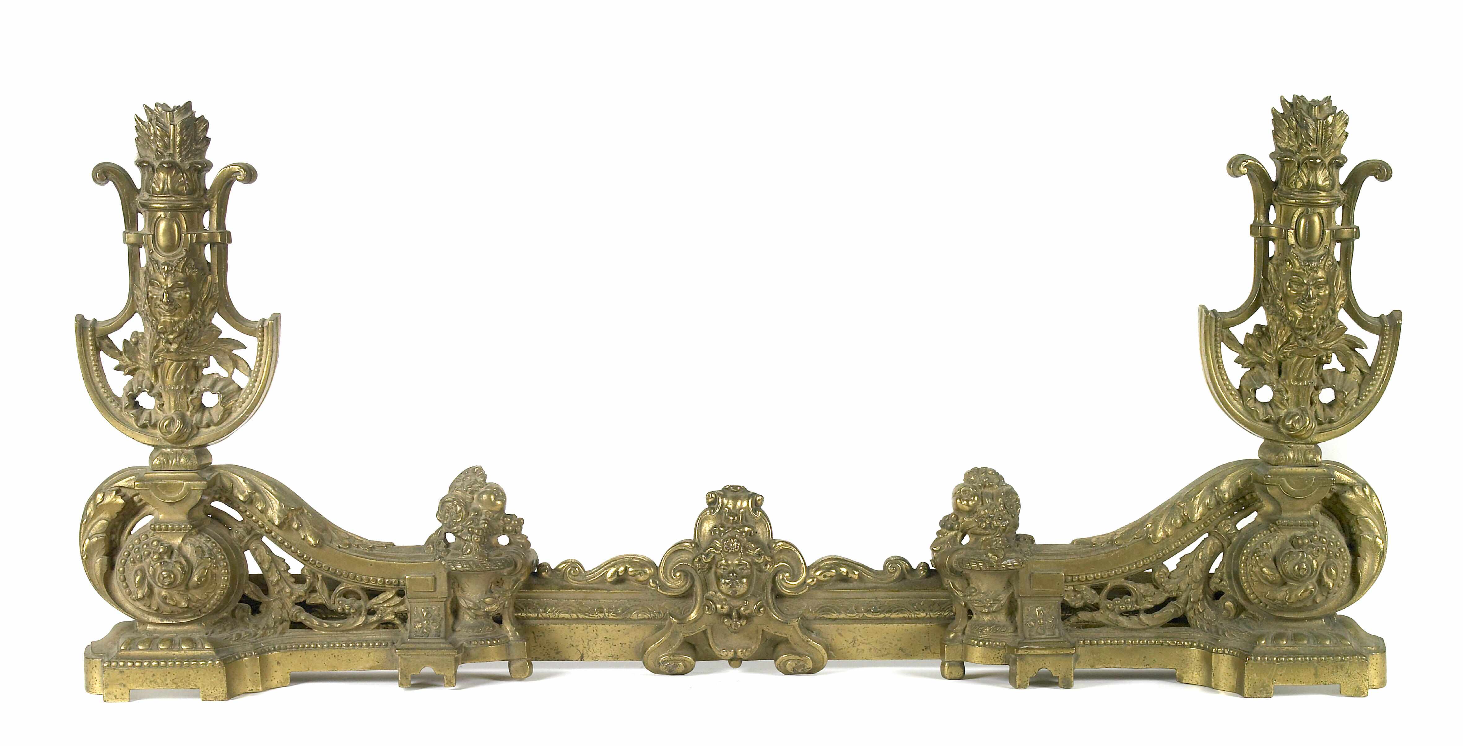 Appraisal: A Louis XV style three piece bronze fireplace set height