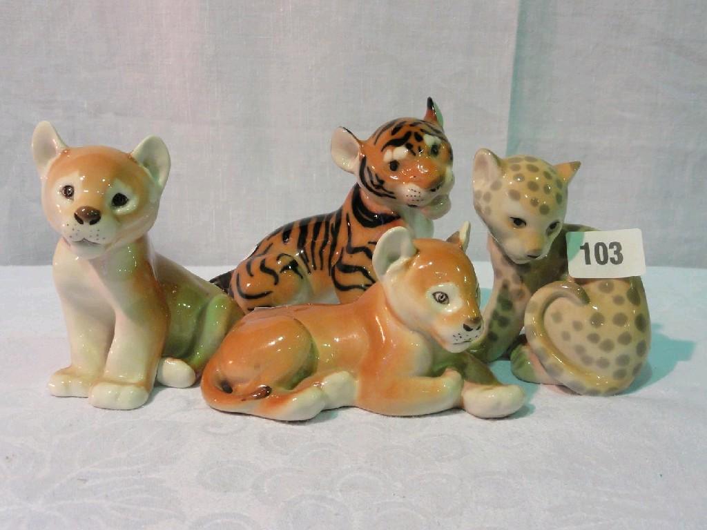 Appraisal: A collection of USSR model animals comprising two lion cubs