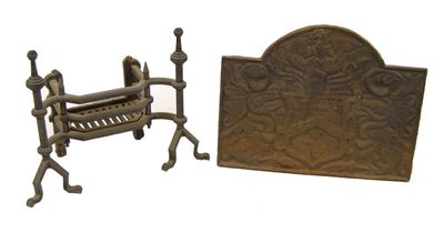 Appraisal: A cast iron firegrate and fireback the arched back decorated