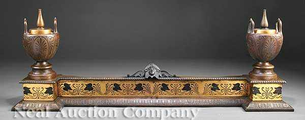 Appraisal: A French Retour d'Egypte Gilt and Patinated Bronze Fireplace Guard