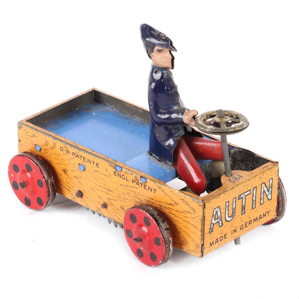 Appraisal: LEHMANN AUTIN TIN LITHO WINDUP CLOCKWORK TOY PEDAL CAR MADE