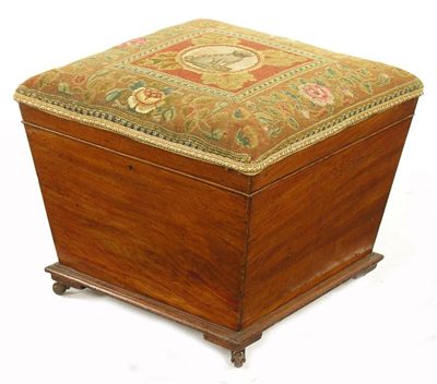 Appraisal: A Victorian mahogany ottoman the floral needlework covered top centred