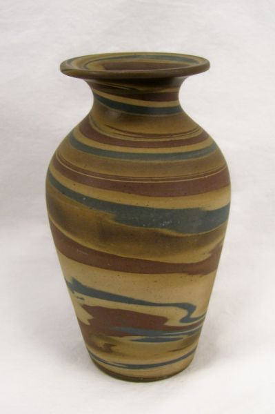 Appraisal: Niloak Vase Swirled blue brown and beige sand art design