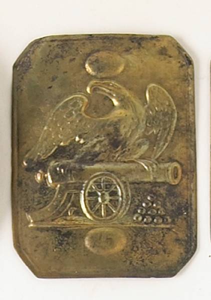 Appraisal: An Pattern Artillery enlistedman's cap plate Die-struck brass reverse with