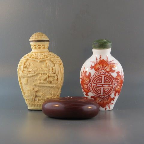 Appraisal: Chinese Snuff Bottles white cinnabar nut porcelain largest is excellent