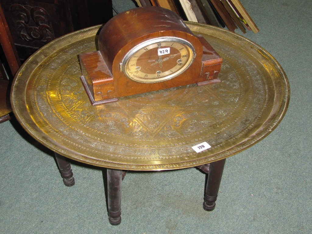 Appraisal: Eastern brass top table and a mantel clock