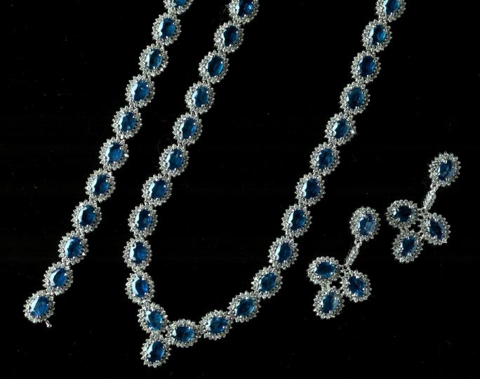 Appraisal: Four-Piece Fourteen-Karat White Gold Sapphire and Diamond Ensemble the necklace