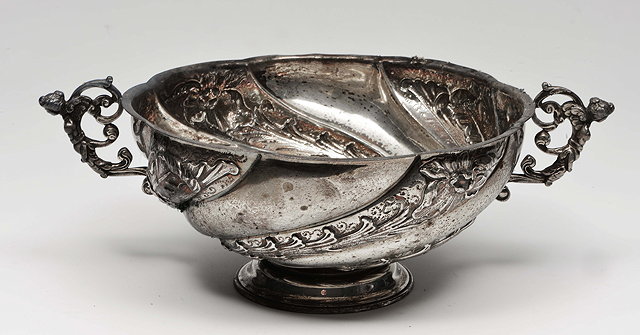 Appraisal: A VICTORIAN SILVER BOWL with two scrolling handles embossed swirl