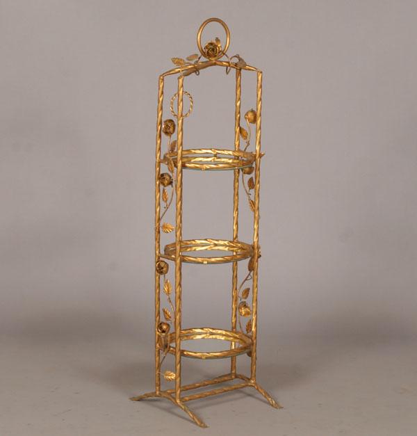 Appraisal: Gilt metal folding muffin tea stand ornate floral and vine