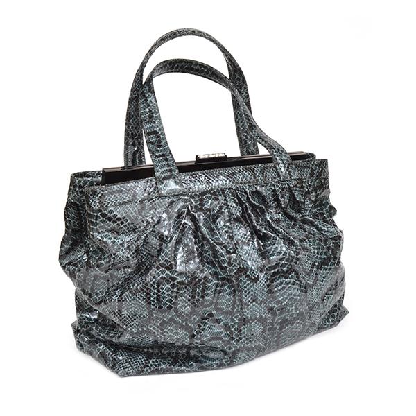 Appraisal: AN OVERSIZED HAND BAG IN FAUX SNAKESKIN BY GUISEPPE ZANOTTI