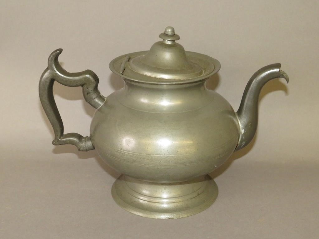 Appraisal: ENGLISH BRITANNIA TEAPOTca English Britannia baluster teapot with London touch