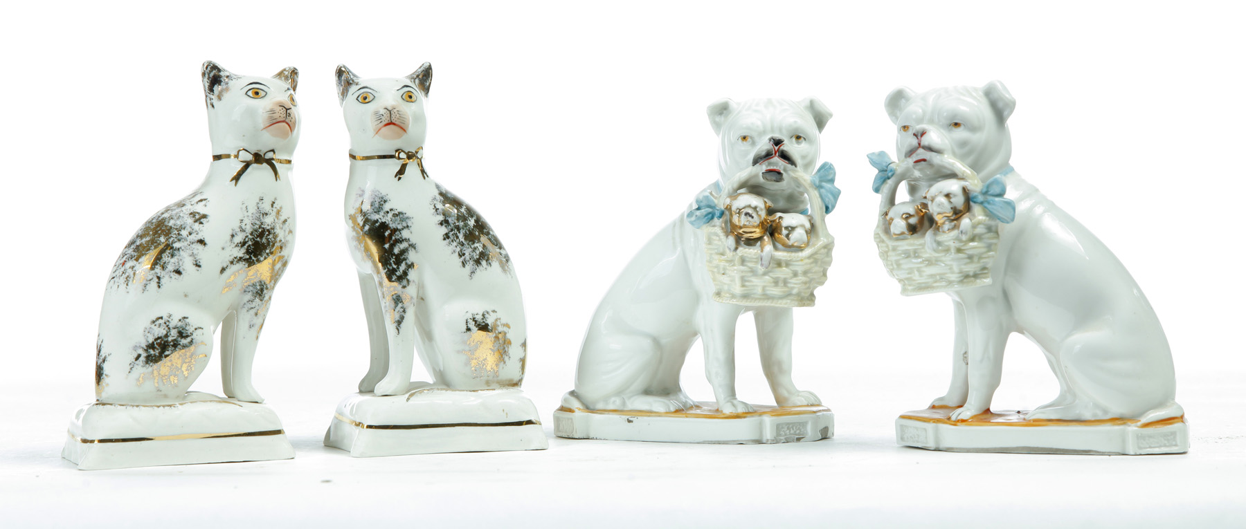 Appraisal: TWO PAIR OF EUROPEAN CERAMIC ANIMALS Late th century Staffordshire