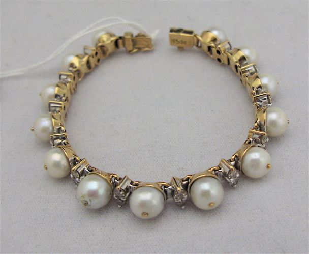 Appraisal: PEARL DIAMOND AND FOURTEEN KARAT GOLD BRACELET - inches in