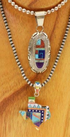 Appraisal: lot of Southwest style sterling silver pendants with multi-stone inlay