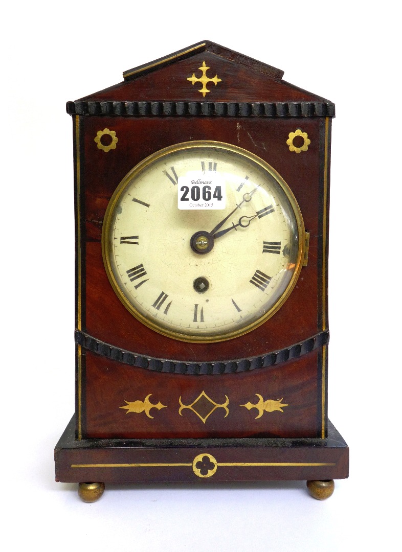 Appraisal: A Victorian mahogany and brass inlaid mantel clock mid- th