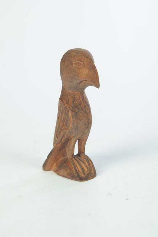 Appraisal: FOLKSY CARVING Natural finish wood th century Goofus bird by