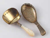 Appraisal: Two Georgian silver caddy spoons by Joseph Wilmore one with