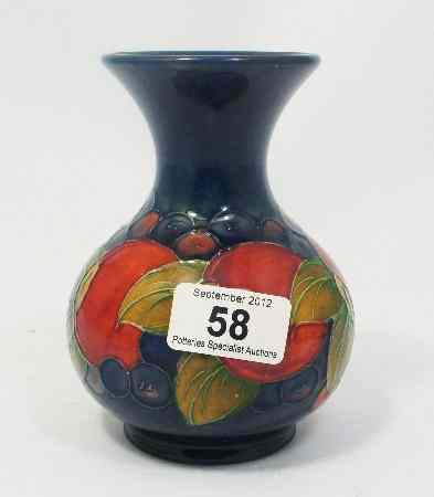 Appraisal: Moorcroft Vase decorated with Pomegranates and Grapes height cm