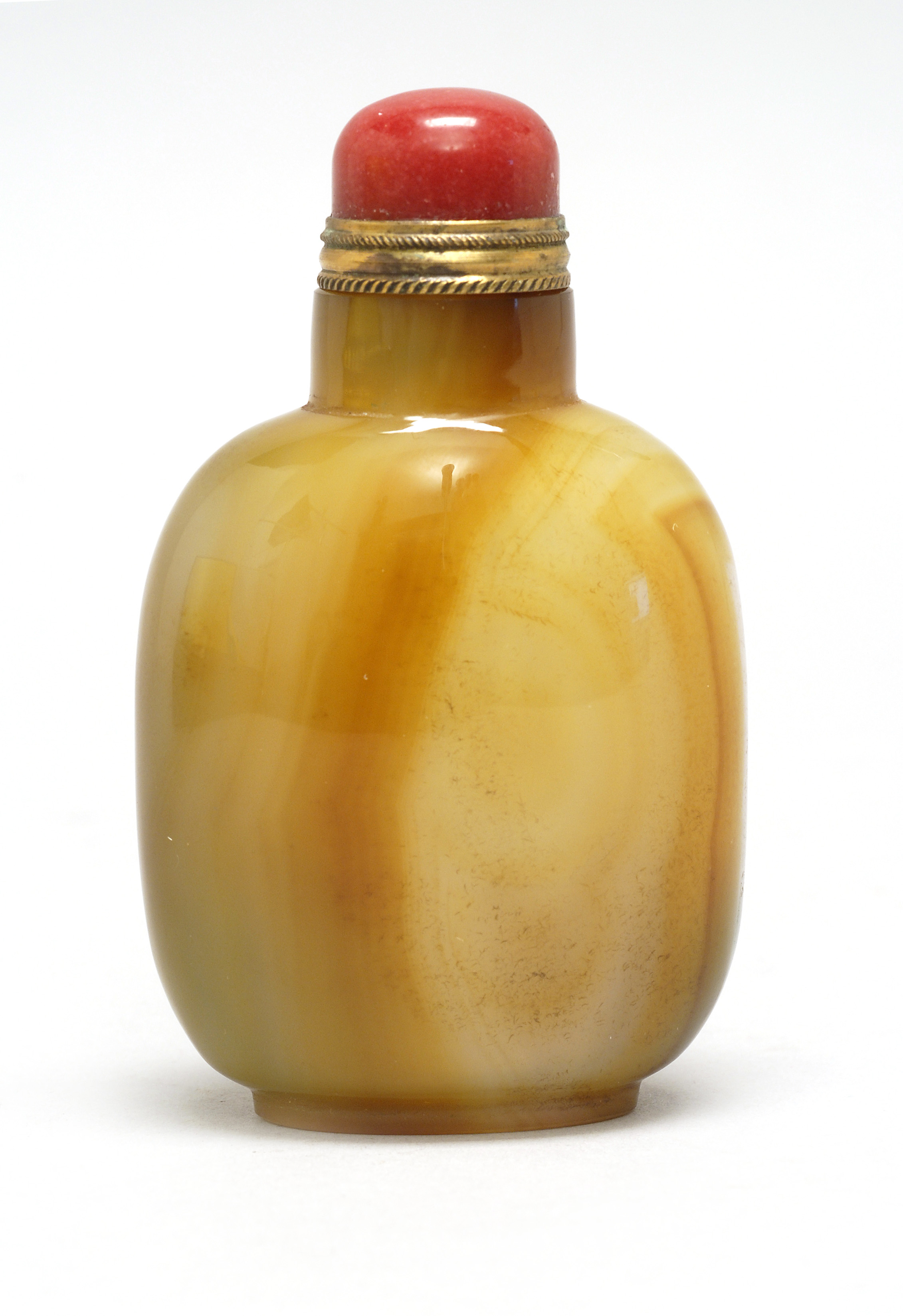 Appraisal: CHALCEDONY AGATE SNUFF BOTTLE th CenturyIn elongated ovoid form with