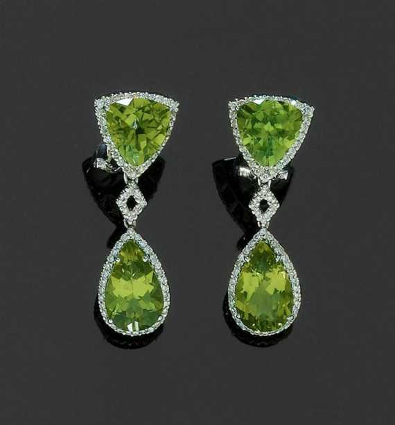 Appraisal: PERIDOT AND BRILLIANT-CUT DIAMOND PENDANT EARRINGS White gold Decorative clip