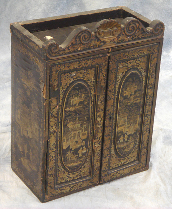 Appraisal: Chinese door cabinet with lacquered decoration inside and out extensive