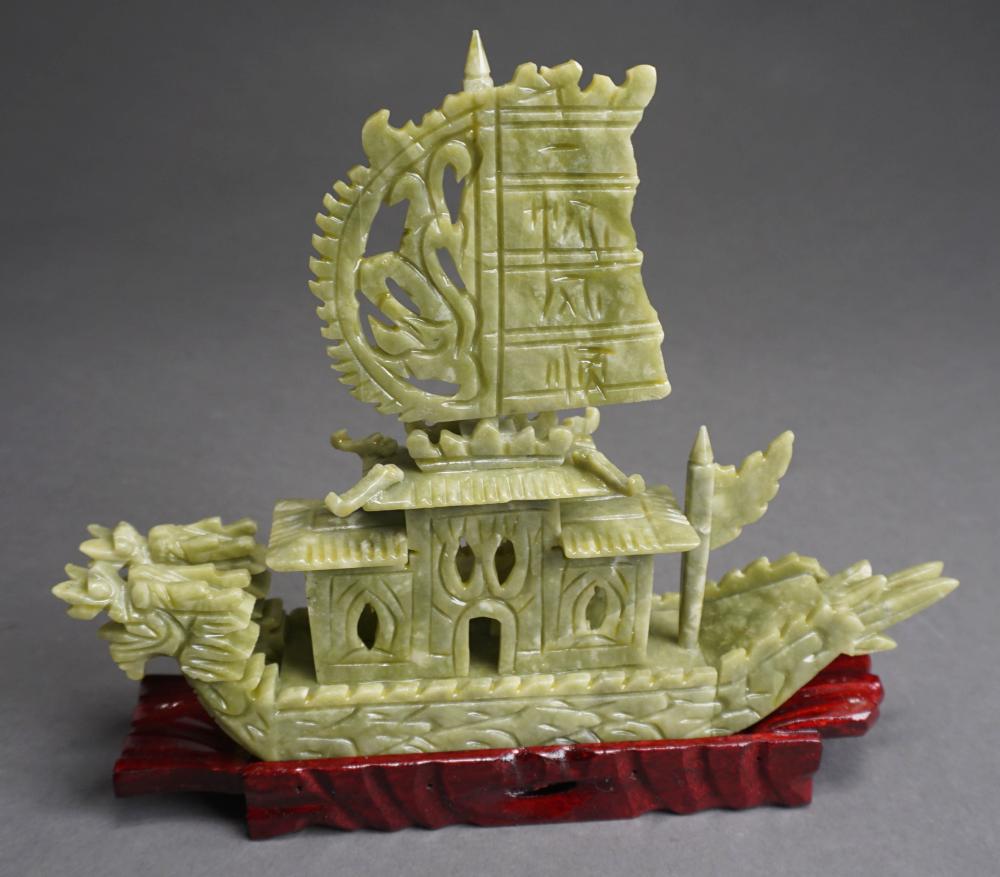 Appraisal: CHINESE CARVED GREEN FINISHED HARDSTONE BOAT ON WOOD STAND H