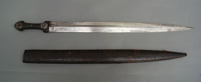 Appraisal: A large Russian Kindjal inch single fullered blade steel mounted