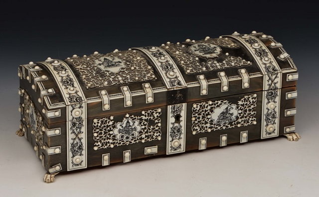 Appraisal: AN ANGLO-INDIAN DOME TOP CASKET with horn panels and profuse