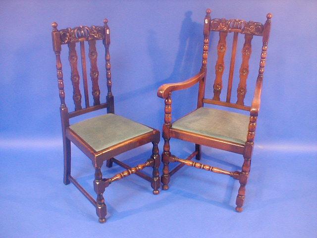 Appraisal: A set of six Jacobean style oak dining chairs with