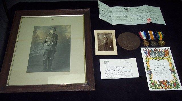 Appraisal: Memorial Plaque and WWI medals the plaque to Henry Watts