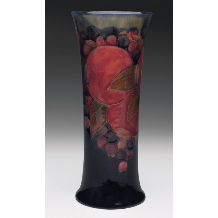 Appraisal: Moorcroft vase rich pomegranate design impressed mark green painted signature