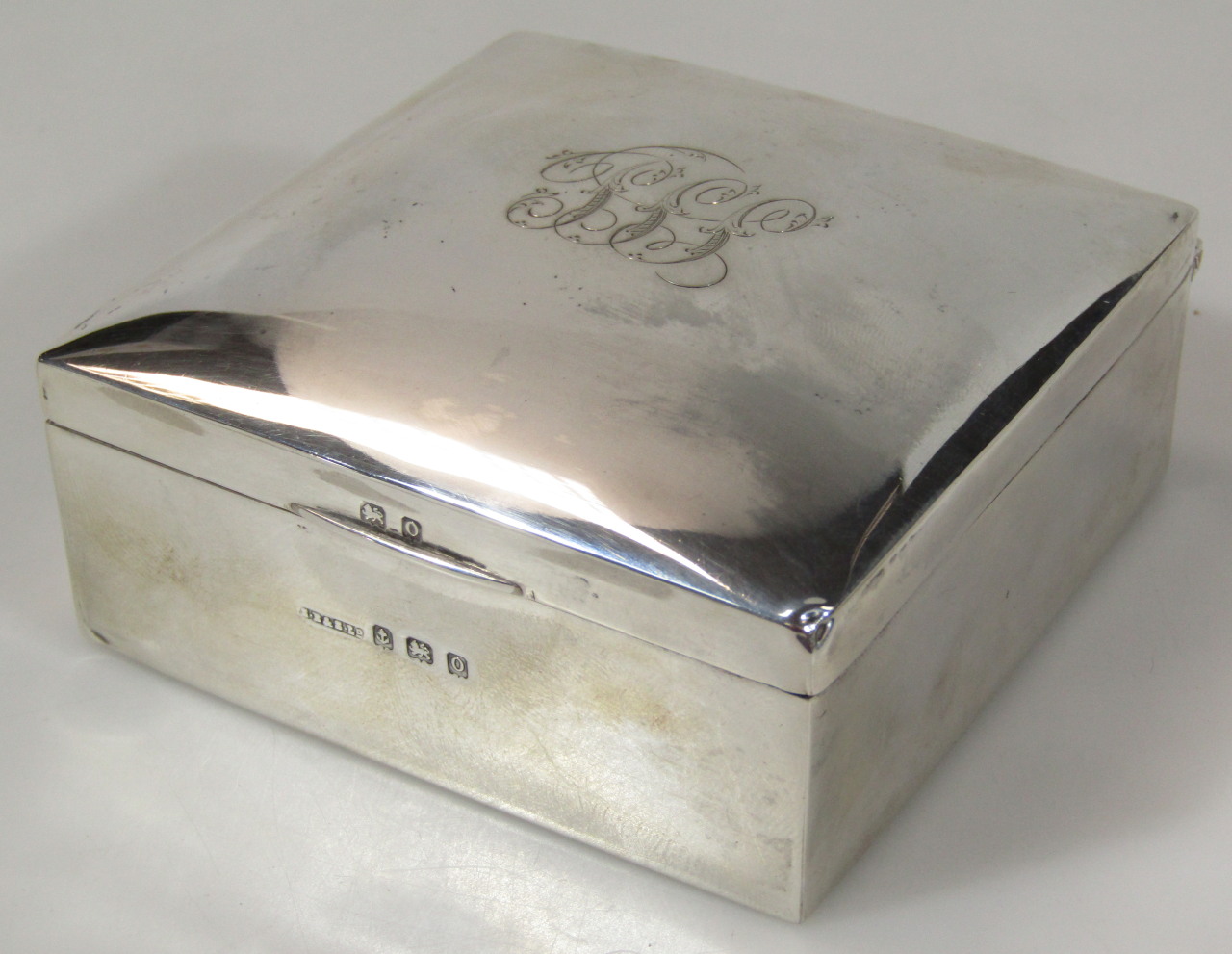 Appraisal: A George VI silver cigarette box of square outline with