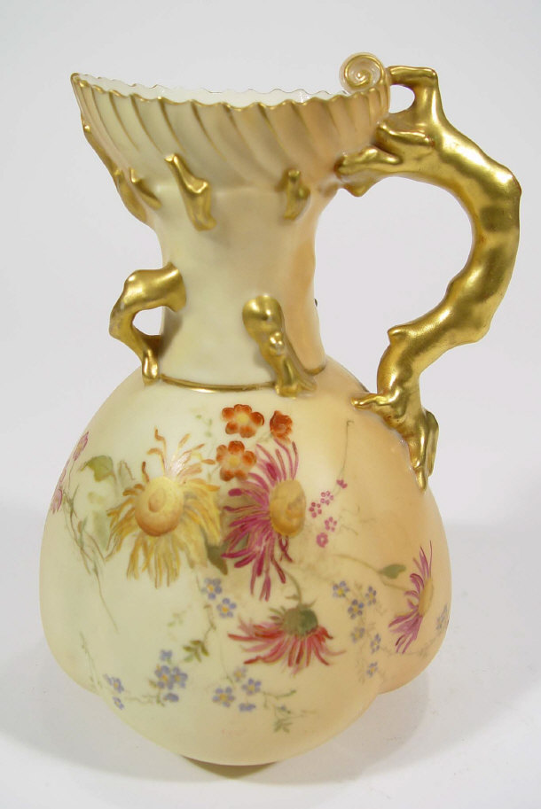 Appraisal: Royal Worcester blush ivory ground ewer hand painted and gilded