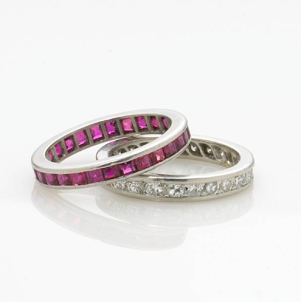 Appraisal: A pair diamond and synthetic ruby eternity bands estimated total