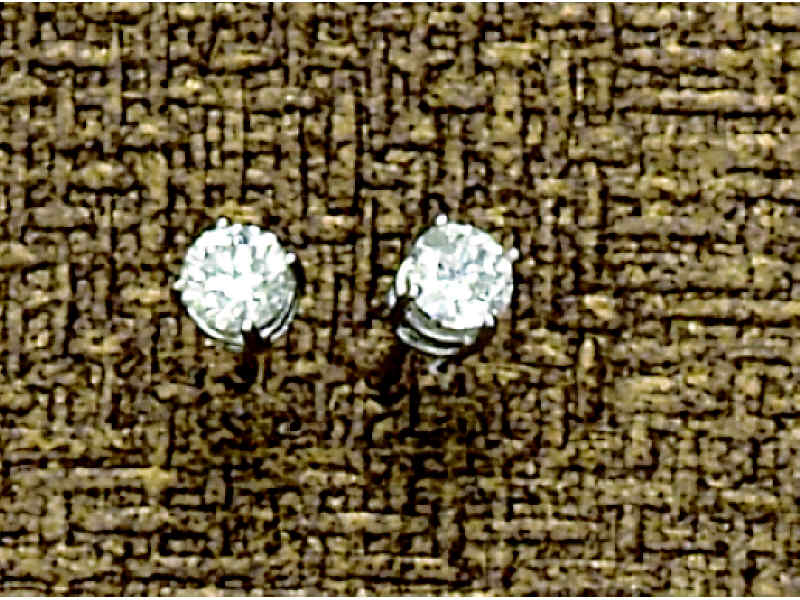 Appraisal: DIAMOND STUDS k white gold pierced earrings set with two