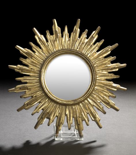 Appraisal: Italian Giltwood Sunburst Looking Glass mid- th century in the