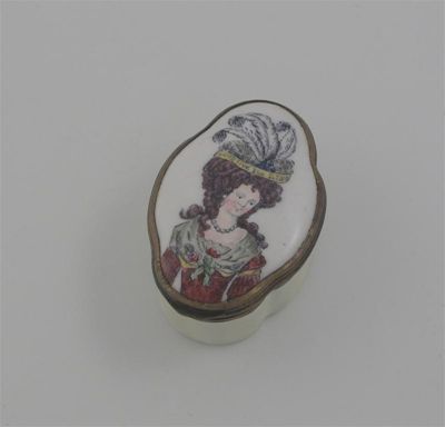 Appraisal: An enamelled copper pill box with the portrait of a