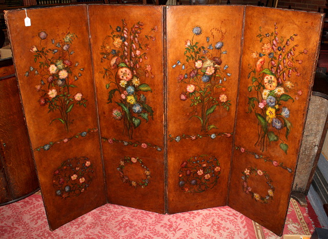 Appraisal: A DECORATIVE FOUR FOLD LEATHER AND BRASS STUDDED DRAUGHT SCREEN