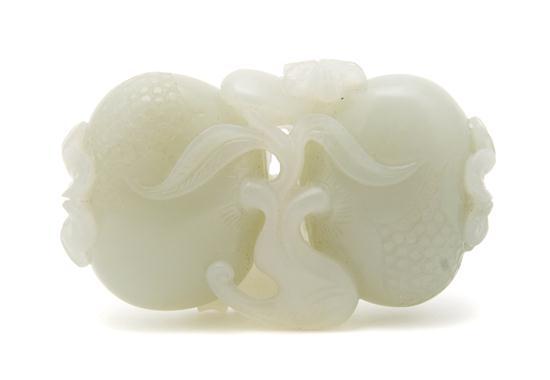 Appraisal: Jade Carving of Two Pomegranates with pierce carving between a