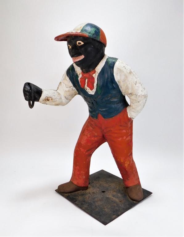 Appraisal: BLACK AMERICANA CAST IRON LAWN JOCKEY United States Mid th